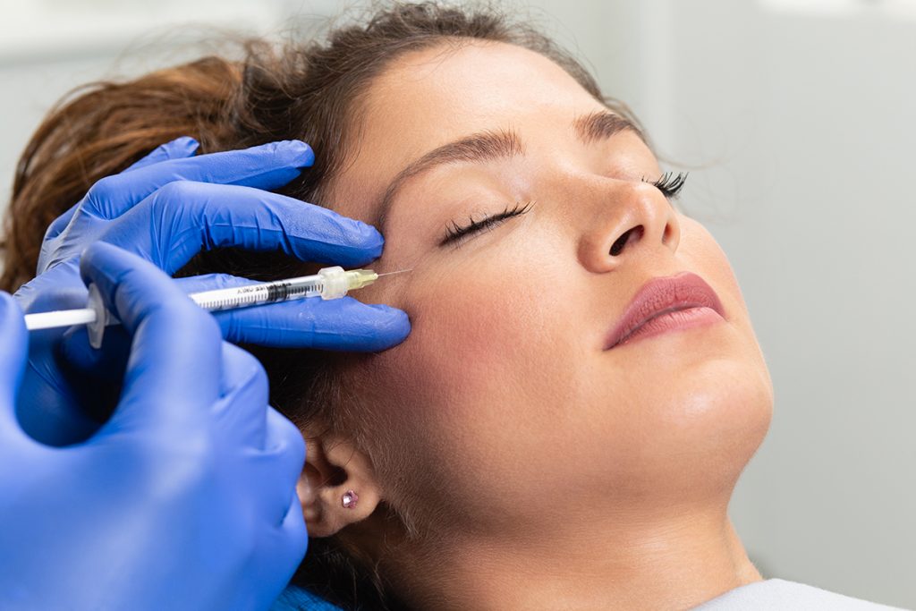 Woman getting Botox treatment at a medical spa