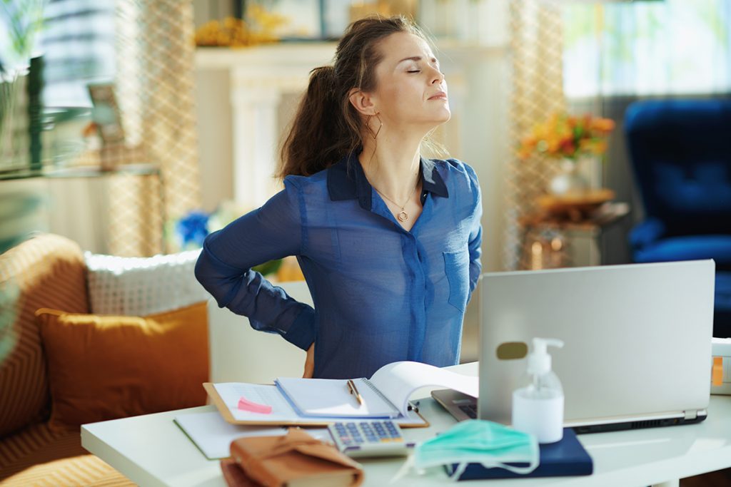 woman stretching with boston plastic surgery harvard health stretch routine at home