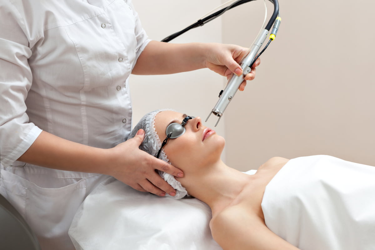 Woman getting a CoolPeel treatment at a Boston med spa